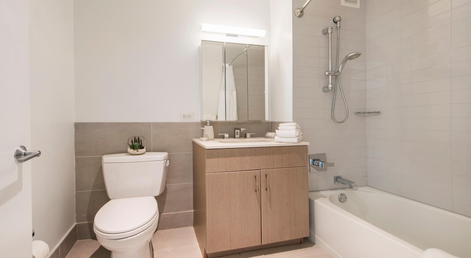 Spacious bathrooms with everything you need a bathroom with a toilet and sink