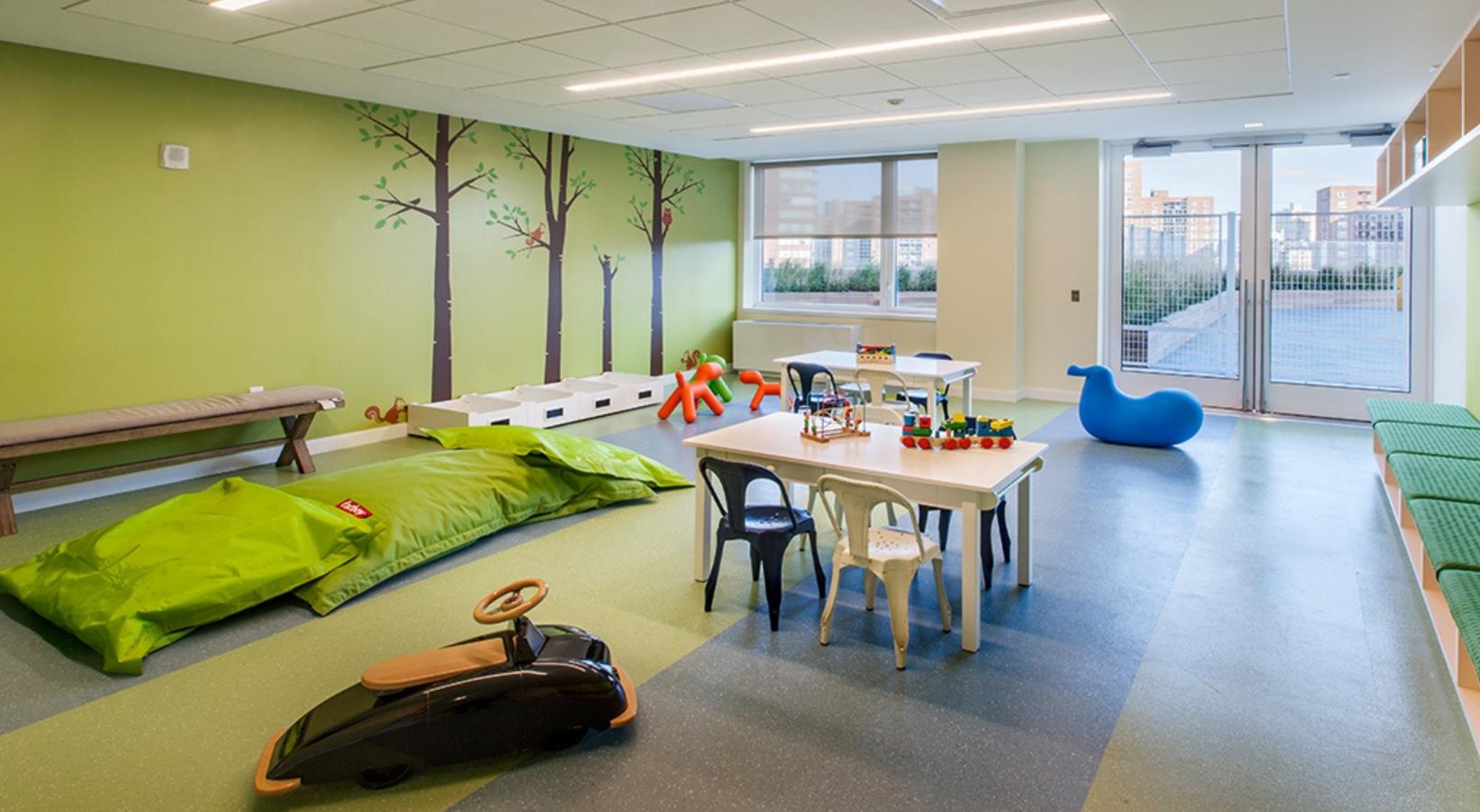 Settle into comfort at The Alexander a room with a table and chairs