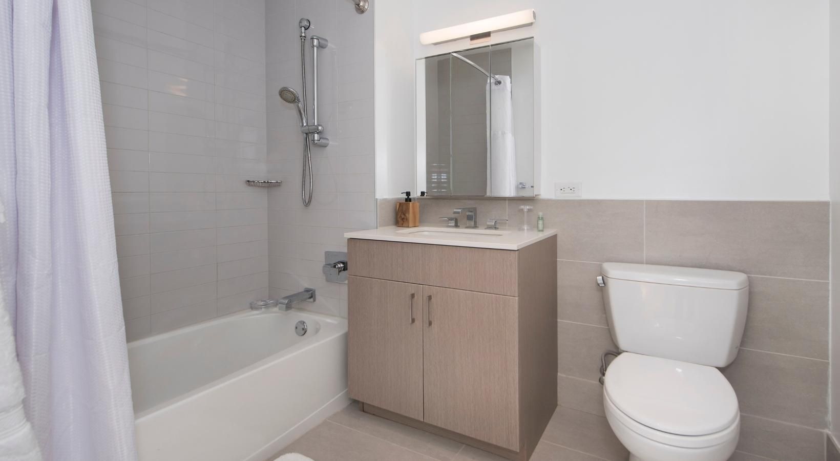 Bathroom options with thoughtful details a bathroom with a toilet and sink