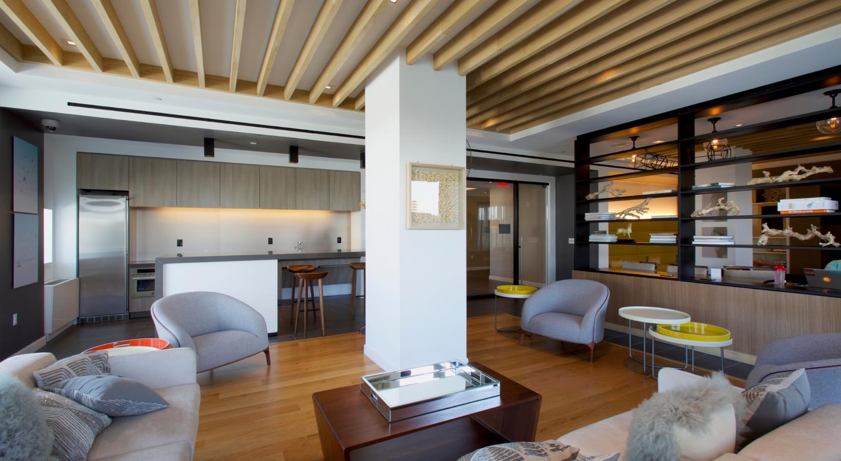 The essence of exceptional living a living room with a bar and chairs