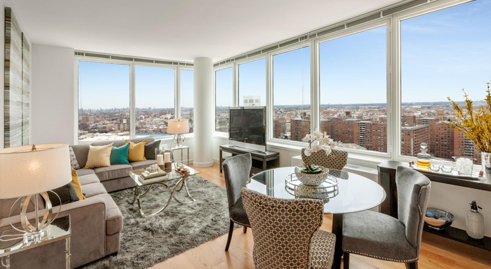 Generous living spaces to relax and unwind a living room with a large window