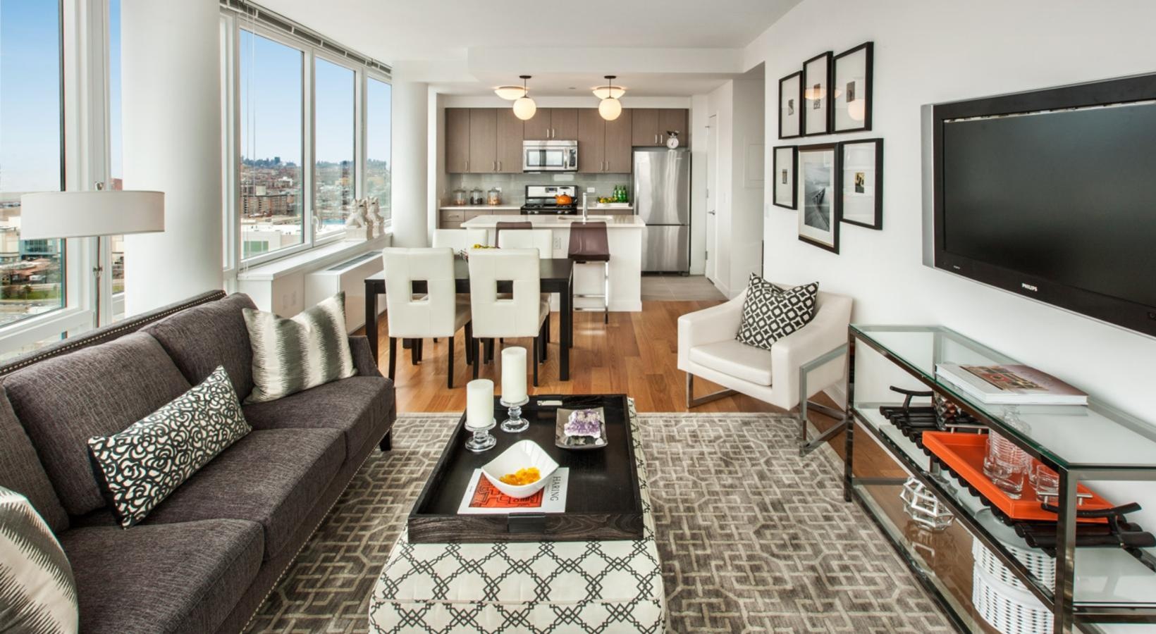 Relax and unwind in stylish living spaces a living room with a tv and couches