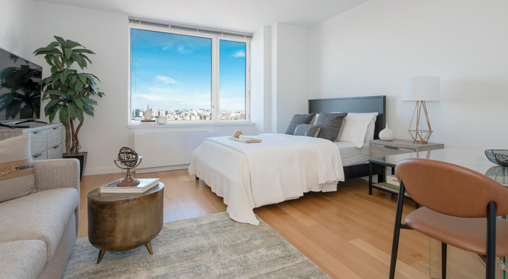 Bedroom options to fit every lifestyle a bedroom with a bed and a chair