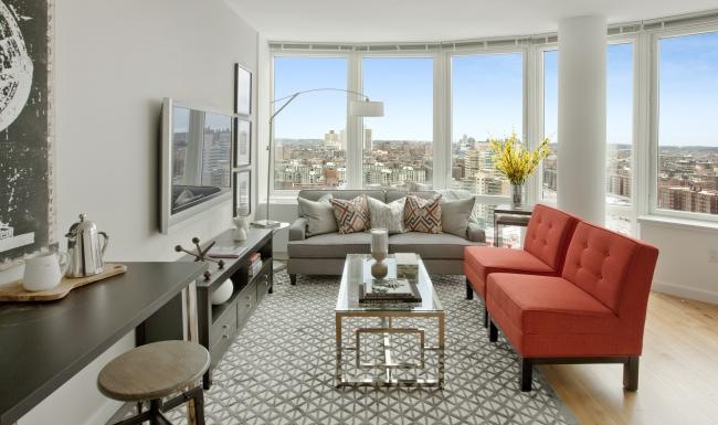 Generous living spaces to relax and unwind a living room with a tv and couches