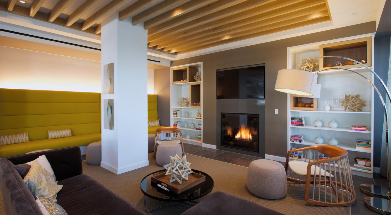 Take advantage of all The Alexander has to offer a living room with a fireplace